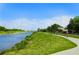 Paved trail alongside canal, ideal for cycling or walking at 790 Shadow Bay Way, Osprey, FL 34229