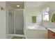 Bathroom with a shower/tub combo and a window at 8108 Haven Harbour Way, Bradenton, FL 34212