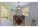 Bright dining area with table and chairs near entryway at 8108 Haven Harbour Way, Bradenton, FL 34212