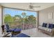 Screened balcony overlooking lush Florida landscape at 9499 Millbank Dr # 2721, Sarasota, FL 34238