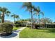 Landscaped walkway leads to community clubhouse and pool area at 9499 Millbank Dr # 2721, Sarasota, FL 34238