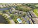 Aerial view of community near golf course and pool at 9621 Castle Point Dr # 1024, Sarasota, FL 34238