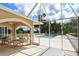 Relaxing screened-in patio overlooking the pool at 9621 Castle Point Dr # 1024, Sarasota, FL 34238