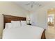 Comfortable bedroom with a queen bed and access to another room at 307 Compass Point Dr # 101, Bradenton, FL 34209