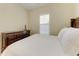 Spacious bedroom with a dresser and a large window at 307 Compass Point Dr # 101, Bradenton, FL 34209