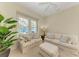 Bright living room with a comfortable seating area at 307 Compass Point Dr # 101, Bradenton, FL 34209