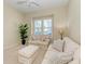 Cozy living room with comfortable sofas and a window seat at 307 Compass Point Dr # 101, Bradenton, FL 34209