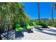 Relaxing green lounge chairs overlook the water at 307 Compass Point Dr # 101, Bradenton, FL 34209