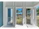 Bright screened porch with water views at 307 Compass Point Dr # 101, Bradenton, FL 34209