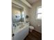 Neat and clean half bathroom with updated vanity at 1144 Hoover St, Nokomis, FL 34275