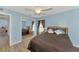 Bedroom with a double bed and mirrored closet doors at 1144 Hoover St, Nokomis, FL 34275