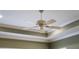 Elegant ceiling fan with detailed design at 11816 Altamonte Ct, Venice, FL 34293