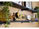 Stylish shelving with decorative objects and plants at 11816 Altamonte Ct, Venice, FL 34293