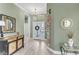 Elegant entryway with decorative accents and seashell decor at 11816 Altamonte Ct, Venice, FL 34293