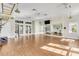 Spacious exercise room with hardwood floors and large mirrors at 11816 Altamonte Ct, Venice, FL 34293