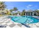 Large resort-style pool with adjacent clubhouse at 11816 Altamonte Ct, Venice, FL 34293