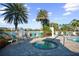 Relaxing spa surrounded by palm trees at 11816 Altamonte Ct, Venice, FL 34293