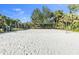 Outdoor sand volleyball court perfect for recreation at 11816 Altamonte Ct, Venice, FL 34293