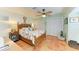 Cozy bedroom features a wooden bed frame and built-in closet at 1220 De Narvaez Ave, Bradenton, FL 34209