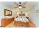 Serene bedroom with a wooden bed frame and plenty of closet space at 1220 De Narvaez Ave, Bradenton, FL 34209