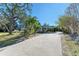 Ranch home with carport & mature landscaping at 1220 De Narvaez Ave, Bradenton, FL 34209