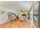 Charming game room features a vintage pinball machine, fireplace and tiled floor at 1220 De Narvaez Ave, Bradenton, FL 34209