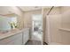 Bright bathroom with double vanity and shower at 13014 Bayberry Way, Parrish, FL 34219