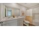 Bathroom with double vanity and bathtub at 13014 Bayberry Way, Parrish, FL 34219