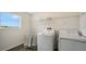 Laundry room with washer, dryer, and storage at 13014 Bayberry Way, Parrish, FL 34219