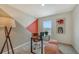 Home office with geometric accent wall and window at 13014 Bayberry Way, Parrish, FL 34219