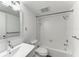 Bathroom with white tile and a bathtub at 1510 1St W Ave # 303, Bradenton, FL 34205