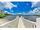 Private dock with gazebo offering picturesque waterfront views at 1510 1St W Ave # 303, Bradenton, FL 34205