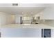 Modern kitchen with stainless steel appliances and white cabinets at 1510 1St W Ave # 303, Bradenton, FL 34205