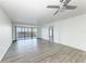 Spacious living room with hardwood floors and water views at 1510 1St W Ave # 303, Bradenton, FL 34205