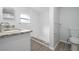 Renovated bathroom, featuring a walk-in shower and new fixtures at 1717 32Nd St, Sarasota, FL 34234