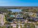 Community center and lakefront aerial view at 1748 Still River Dr, Venice, FL 34293