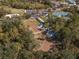 Aerial view of a community dog park with separate areas at 1748 Still River Dr, Venice, FL 34293