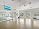 Bright fitness studio with mirrors and plenty of space for exercise at 1748 Still River Dr, Venice, FL 34293