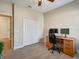 Bright home office with wood desk and two monitors at 1748 Still River Dr, Venice, FL 34293