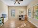 Playroom with toy kitchen and plenty of natural light at 1748 Still River Dr, Venice, FL 34293