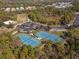 Aerial view of two tennis courts in a community setting at 1748 Still River Dr, Venice, FL 34293