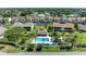 Aerial view showcasing the community pool and surrounding condos at 1767 Lake Pl # 1767A, Venice, FL 34293