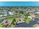 Aerial view of community with homes and pool at 1767 Lake Pl # 1767A, Venice, FL 34293