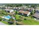 Aerial view of community, showing homes, pool, and landscaping at 1767 Lake Pl # 1767A, Venice, FL 34293