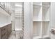 Large walk-in closet with ample shelving and hanging space at 1810 Wisteria St, Sarasota, FL 34239