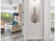 Elegant hallway with recessed lighting and decorative vase at 1810 Wisteria St, Sarasota, FL 34239