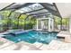 Spacious pool and spa with covered patio and pergola at 1810 Wisteria St, Sarasota, FL 34239