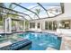 Stunning pool and spa with covered patio and pergola at 1810 Wisteria St, Sarasota, FL 34239