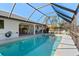 Inviting screened pool with ample deck space at 18314 Koala Ave, Port Charlotte, FL 33948