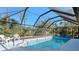 Enclosed pool area with plenty of space for relaxation at 18314 Koala Ave, Port Charlotte, FL 33948